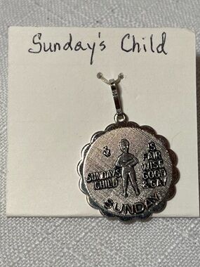 Sarah Coventry "Sunday's Child" nursery rhyme pendant charm from 1976. Vintage